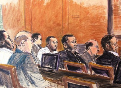 In this courtroom sketch, defendants Onta Williams, left, Laguerre Payen, center in white shirt, David Williams, third from right, and James Cromitie, right, sit with their attorneys in federal court Monday, June 14, 2010.