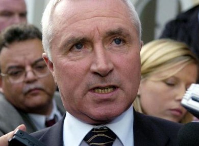 File photo of Jim McDaid speaking to reporters.