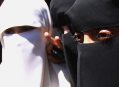 Hanan al-Samawi, right, surrounded by students during a protest at San'a University in the capital San'a, Yemen, today, after the Yemeni police released her.