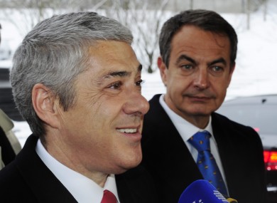 Portuguese Prime Minister Jose Socrates, left, and Spanish Prime Minister Jose Luis Rodriguez Zapatero have had other things on their mind as they attended the World Cup presentation event in Zurich.