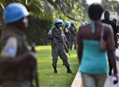 UN soldiers from Senegal stand guard in Abidjan, Ivory Coast.