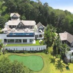 200m from the beach, and inside a gated community, the six-bedroom pad is actually two villas - each with their own swimming pool.