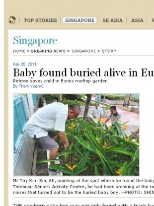 Local media accompanied Mr. Tay Kim Sia to the spot where he found the baby boy