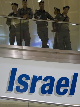 Israeli border police officers stand guard at the arrival terminal in Ben Gurion international airport near Tel Aviv