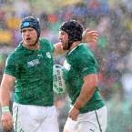 Jamie Heaslip congratulates Sean O'Brien in the rain after he scored a try.