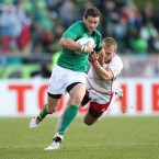 Ireland's Fergus McFadden goes past Denis Simplekevich.