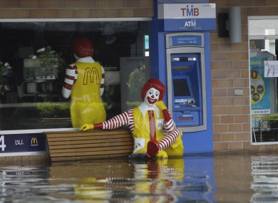 A McDonald's branch partially underwater in Bangkok yesterday