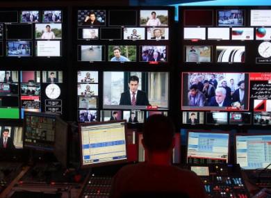 File photo: A BBC Persian service producer at work in the broadcaster's London headquarters.
