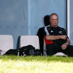 New Zealand coach Graham Henry sits and thinks.
(INPHO/Photosport/Ella Brockelsby)