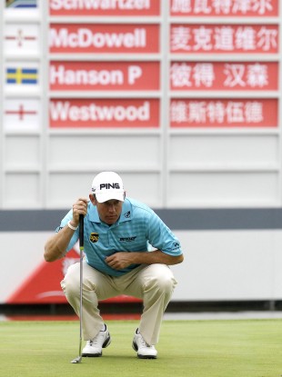 Lee Westwood prepares to putt on the 18th green.