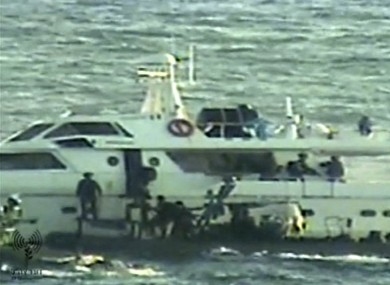 This image released by the Israeli Defence Ministry shows Israeli soldiers boarding one of the protest boats.