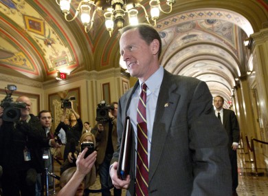 Sen. Patrick Toomey arrives for a meeting with bi-partisan members of the Joint Select Committee on Deficit Reduction