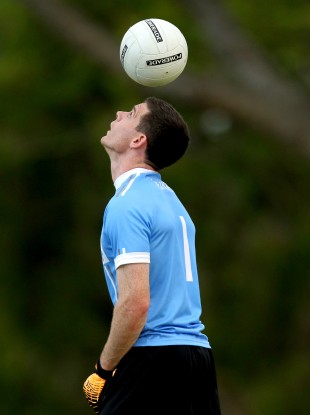 Captain Stephen Cluxton juggles the ball during training at the RACV Royal Pines Resort on the Gold Coast.