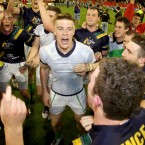 Ireland's Tommy Walsh leads the celebration.