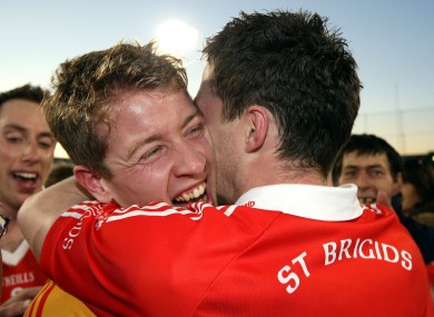 Shane Supple and Paddy Andrews celebrate St Brigid's win in the Dublin SFC final.