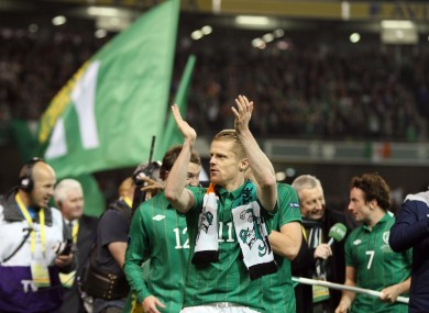 Damien Duff leads team-mates on a lap of honour.