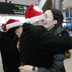 Paula Rooney originally from Ringsend, Dublin is greeted home by her father John and sister Georgina Montgomery today in T2 at Dublin Airport after returning home from Vancouver, Canada, after nearly two years. Photo Mark Stedman/Photocall Ireland
