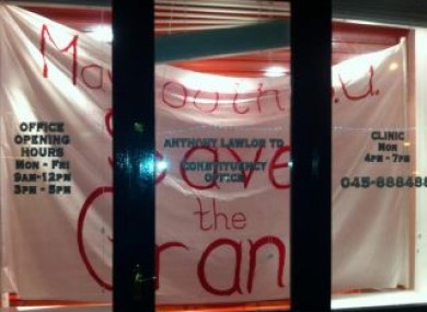 Maynooth SU's 'Save the Grant' sign in the TD's office.