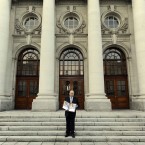 Michael Noonan poses with a hard copy of his Budget for 2012 on the steps of Government Buildings before presenting it to the Dail. Photo Laura Hutton/Photocall Ireland