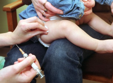 File photo of a baby being immunised for measles