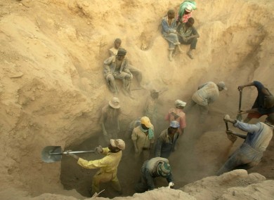 Miners dig for diamonds in Marange, Zimbabwe, Wednesday, Nov. 1, 2006