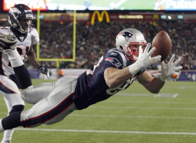 Rob Gronkowski makes one of his three first-half touchdown catches.