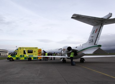 A patient is transferred during one of the air ambulance missions at Casement Aerodrome.