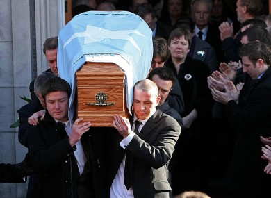 Shane Geoghegan's relatives carry his remains at the funeral in November 2008