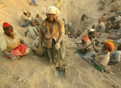 Nov. 1, 2006 file photo miners dig for diamonds in Marange, eastern Zimbabwe