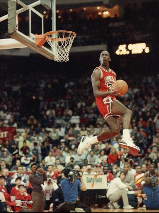 Jordan dunks the ball during the Slam-Dunk championship in Chicago on Saturday, Feb. 6, 1988
