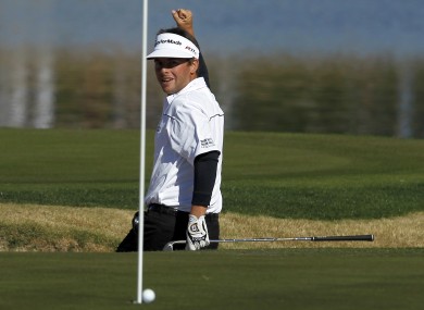 Spencer Levin celebrates as his ball drops for an eagle at the 17th.