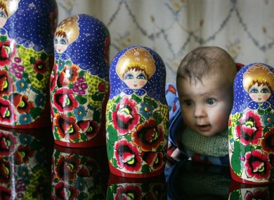 Five-month-old Rodan Rakhmatullin, from Lucan, meets four Russian dolls at the launch of Dublin's Festival of Russian Culture