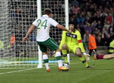 Simon Cox scores Ireland's equaliser four minutes from time.