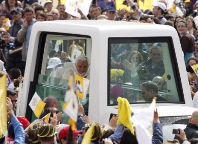 Pope Benedict XVI in his popemobile.