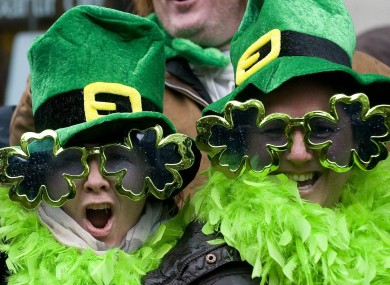 Colourful spectators enjoy the festivities at the 186th consecutive St. Patrick's Day parade in Montreal 2010.
