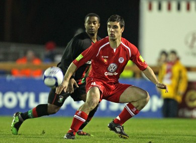 Sligo Rovers' Gavin Peers with Leon Knight of Glentoran on Monday.