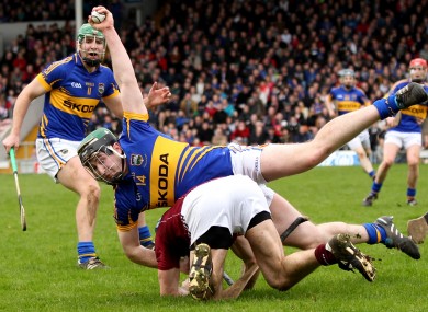 Tipperary's Brian O'Meara wins the ball as he goes to ground with David Collins of Galway.