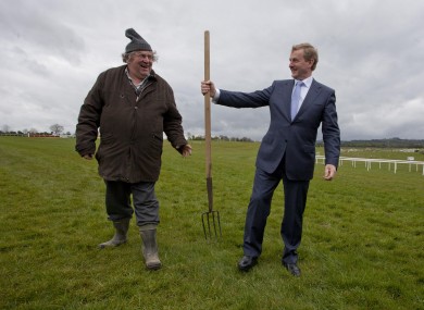 Enda Kenny rocking the wet look at Punchestown on Thursday