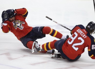 John Madden hits the ice after his sickening clash with Tomas Kopecky