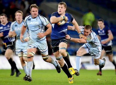 Jamie Heaslip surges past Richie Rees of Cardiff