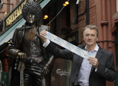 Lord Henry Mountcharles poses with the Phil Lynott statue in Dublin.