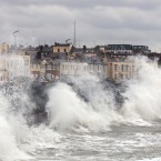 Waves crashing over the promenade in Sandycove, Co Dublin, as storms lash the whole east coast of Ireland. Pic: Justin Farrelly.