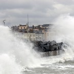 Waves crashing over the promenade in Sandycove, Co Dublin, as storms lash the whole east coast of Ireland. Pic: Justin Farrelly.