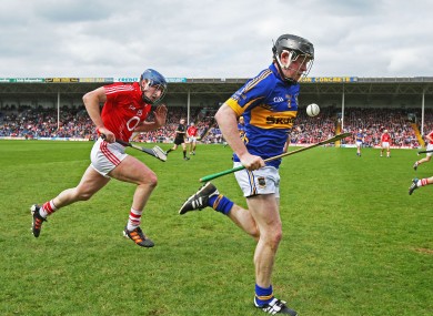 Donagh Maher breaks clear of Cork's Patrick Horgan.