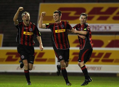 Bohs' Dinny Corcoran (centre) celebrates with teammates Dave Scully and Karl Moore.