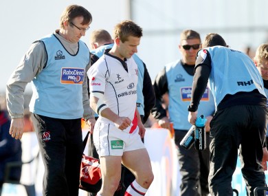 Ulster's Paul Marshall leaves the field injured.