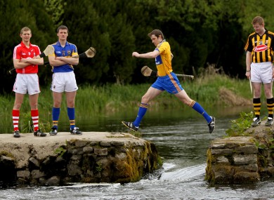 Cork's Lorcan McLaughlin, Tipperary's's Pa Bourke, Kilkenny's Richie Power watch Clare's Pat Donnellan at Holycross Abbey.