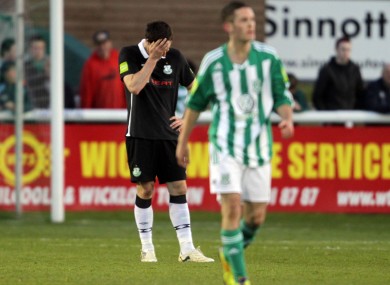 Craig Sives' holds his head after Kieran