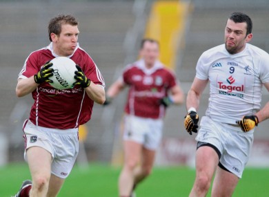 Galway's Kieran McGrath goes up against Padraig O'Neill of Kildare.