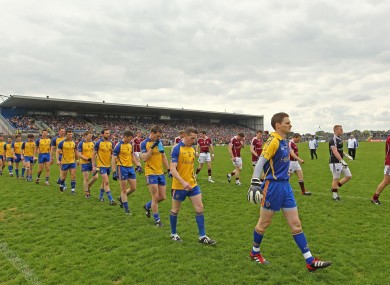 Galway and Roscommon players parade before their game.